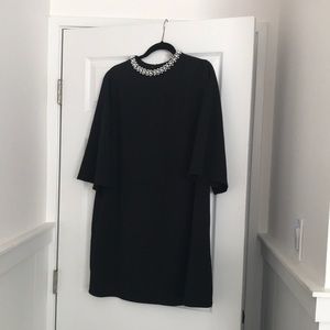 H&M dress with pearls on the collar. Great condition. Size 8